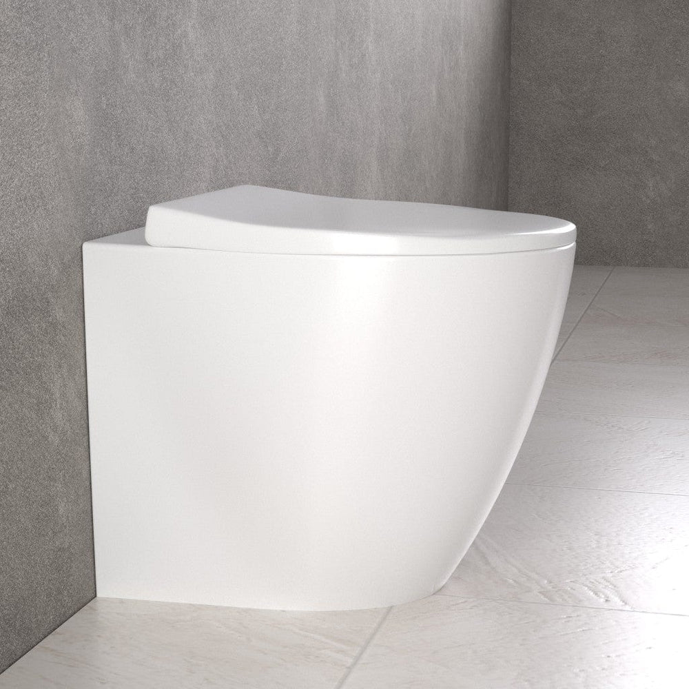 Primo Dolce Back To Wall Rimless Toilet With Concealed Cistern Frame & Brushed Brass Flush Plate